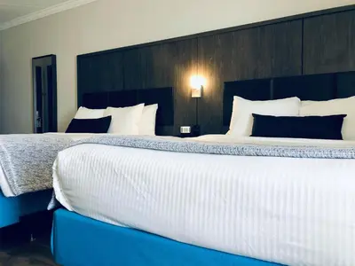 a large bed in a hotel room with two beds at Best Western Laval-Montreal & Conference Centre in Laval