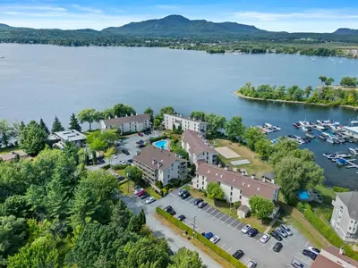 an aerial view of a resort on a lake at O'Berge du Village C304 - Bord de l'eau in Magog-Orford