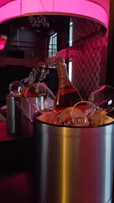 two bottles of wine in a bucket on a table at Chomedey Inn in Laval