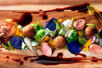 a group of vegetables and meat on a wooden table at Le Westin Montreal in Montréal