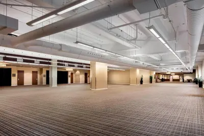a large room with a large empty room with a large room at Le Westin Montreal in Montréal