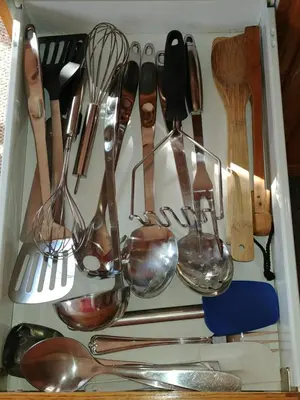 a drawer filled with lots of kitchen utensils at 3 Bedrooms 3 beds near metro -2 Parking Free in Montréal
