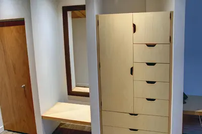 a room with a closet with a stack of drawers at Suite Marie-Thérèse in Vallée-Jonction