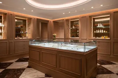 a jacuzzi tub in a room with wooden cabinets at Four Seasons Hotel Montreal in Montréal