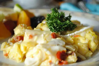 a plate of food with pasta and vegetables on a table at Auberge Marquis de Montcalm in Sherbrooke