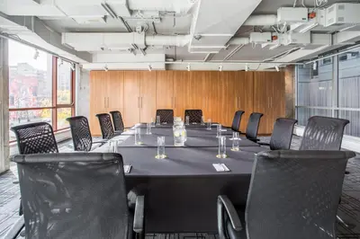 a conference room with a long table and chairs at Hotel Zero 1 Montreal in Montréal