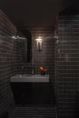 a bathroom with a sink and a mirror at Maison Sainte-Thérèse By Maisons & co in Montréal