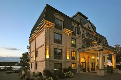 a large house with a gambrel roof at St Christophe Hotel & Spa, an Ascend Collection Hotel in Granby
