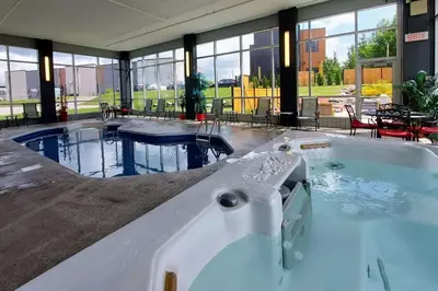 a large jacuzzi tub in a large building at Quality Inn & Suites in Victoriaville