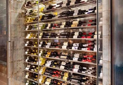 a display case filled with lots of cars at le Georgesville in Saint-Georges