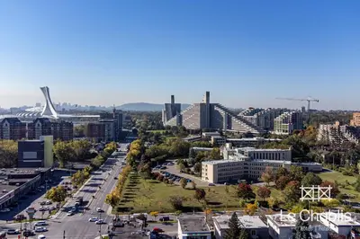 an aerial view of a city with tall buildings at Hotel Le Chablis Cadillac in Montréal