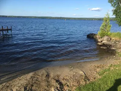 a view of a large body of water at La Grange sur le Lac App A et B in Saint Romain