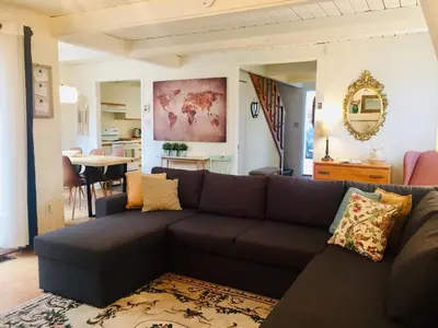 a living room with a couch and a table at Le Jackrabbit Orford Domaine Cheribourg in Orford