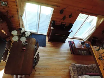 an overhead view of a dining room with a table at Chalets Garou in St-Ferdinand