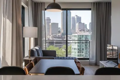 a hotel room with a view of a city at Griffintown Hôtel in Montréal