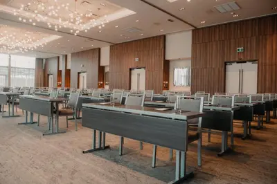 a banquet hall with tables and chairs in a room at Homewood Suites By Hilton Montreal Midtown in Montréal