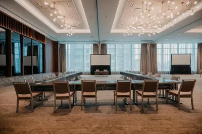 a large conference room with a long table and chairs at Homewood Suites By Hilton Montreal Midtown in Montréal