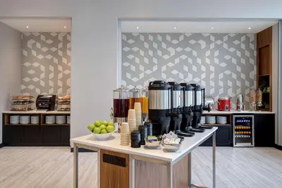 a kitchen with a counter with a coffee maker on it at Hampton Inn Montreal Downtown, Qc in Montréal