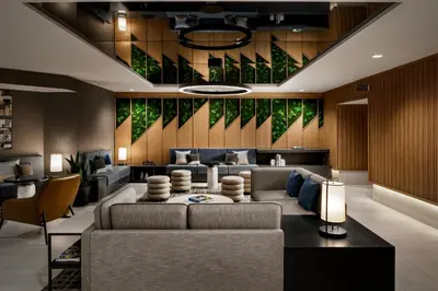 a living room with a couch and chairs at Hyatt Place Montreal - Downtown in Montréal