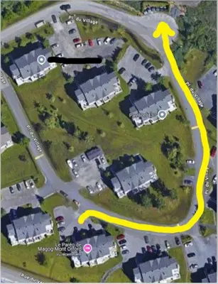 a map of a neighborhood with a yellow arrow at Le Paréo de Magog-Mont Orford in Magog-Orford