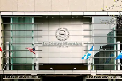 a sign on the side of a building at Le Centre Sheraton Montreal Hotel in Montréal