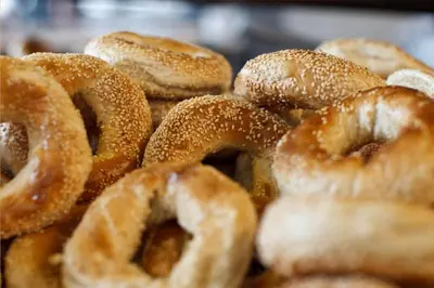 a pile of donuts sitting on top of each other at Auberge Les Bons Matins in Montréal