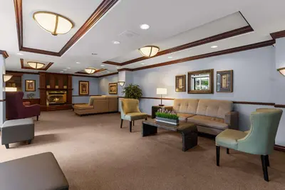 a large living room with couches and chairs at Best Western Ville-Marie Montreal Hotel & Suites in Montréal