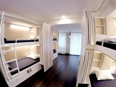 a room with two bunk beds in it at M Montreal Hostel in Montréal