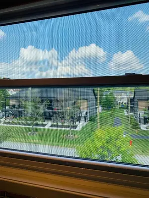 a view from a window of a building at Le Philémon Club Azur plage Memphrémagog in Magog-Orford