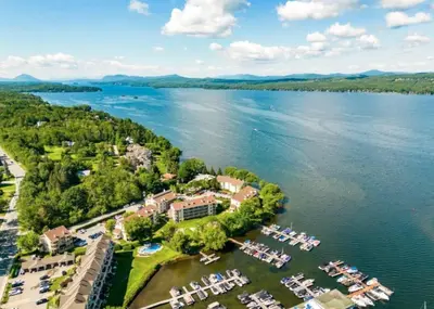 an aerial view of a resort on a lake at Magog Waterfront Studio 106 in Magog-Orford