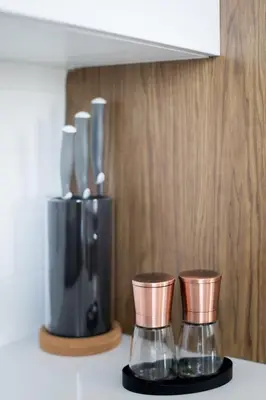 a kitchen counter with a blender and two cups at Stunning 1 Bedroom in Mile End by Den Stays in Montréal
