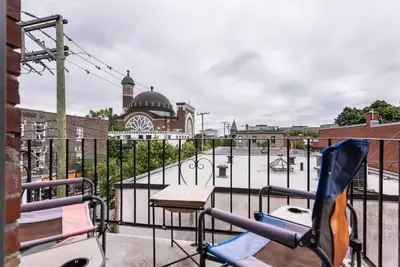 a view from the balcony of a playground at 2 Bedroom Luxury in the Mile End by Den Stays in Montréal