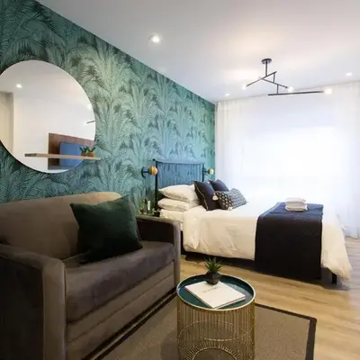 Studio Palms Steps from JeanTalon Market Full Bath by Den Stays