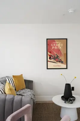 a living room with a couch and a table at François-Denis Apartments in Montréal