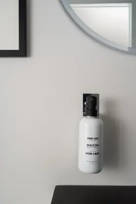 a close up of a white bottle of medication at François-Denis Apartments in Montréal
