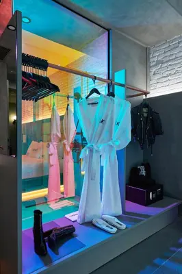 a display window of a store with dresses and shoes at David Hotel in Montréal