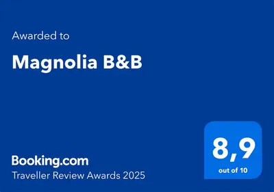 a blue square with the words magnolia bbb on it at Magnolia B&B in Granby
