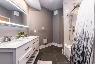 a bathroom with a shower and a sink at Family Friendly 3-bedroom beauty in Le Plateau by DenStays in Montréal
