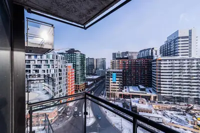 a view of a city from a balcony at WERFY Luxury Apart-Hotel in Montréal