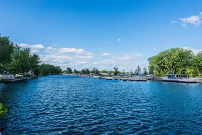 a view of a river with boats on it at Centennial 6-Bedroom Waterfront Palace Sleeps 14 in Montréal
