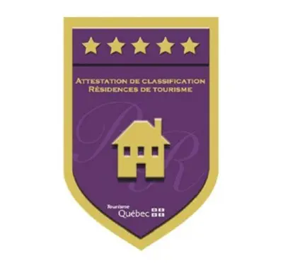 a shield with a house and stars on it at Cozy spacious Apt In Laval, Greater Montreal in Laval
