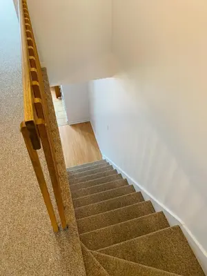 a staircase leading up to a room with a ladder at Condo Club Azur Plage Memphremagog in Magog-Orford
