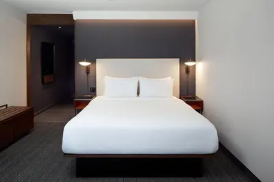 a large white bed in a hotel room at Residence Inn Montreal Midtown in Montréal