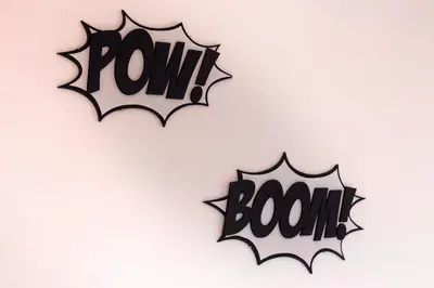 two bats with the word boom written on them at POP - SelfCheckIn - Rooftop - Terraces - St-Denis in Montréal