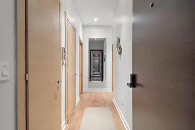a hallway with a door and a hallway with at The Nomad Saint Jacques in Montréal