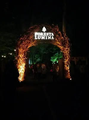 a lit up arch with a sign on top of it at House & loft, pool table, ping-pong, fireplace, AC in Ayer's Cliff