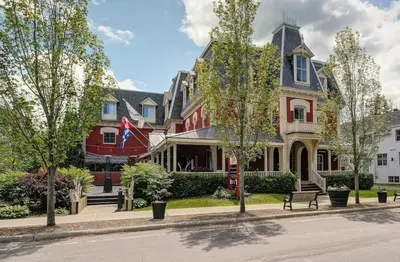 a row of houses on a city street at Bromont Lodge 871 Shefford suite 205 in Bromont