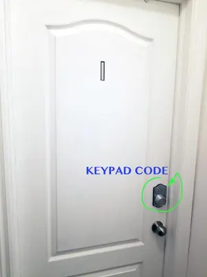 a door with the keypad code written on it at A&I Cosy&Bright Apartments near Old Port and South Shore in Longueuil