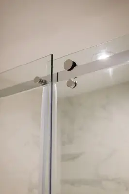 a ceiling fan in a room with a window at Palms Little Italy Studio with full bathroom by Denstays in Montréal