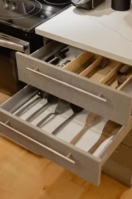 a drawer in a kitchen with some utensils at Rozenhaus Hotel Montreal in Montréal